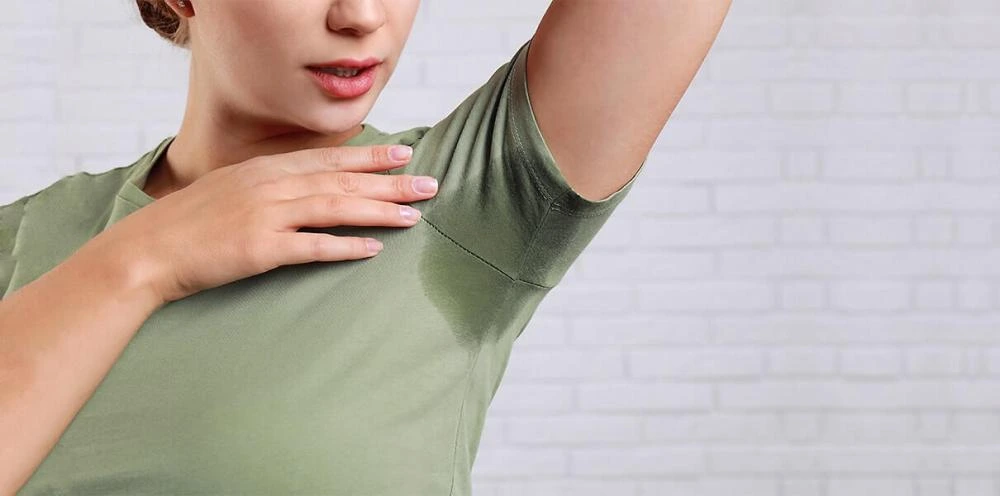 Sweating armpits from axillary hyperhidrosis before Hidroxa iontophoresis treatment