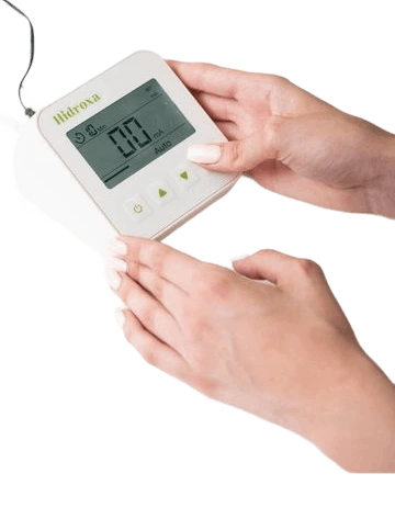 Adjusting Hidroxa iontophoresis machine settings for hyperhidrosis treatment